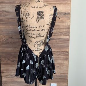 Original Sin Romper with gold ring trim